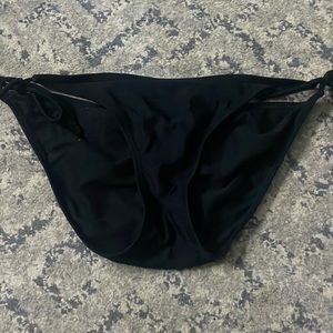 Black bathing suit bottoms.